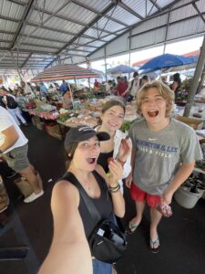 HG, Kaden, and me eating rambutan 