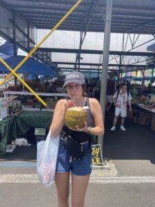 me drinking a coconut